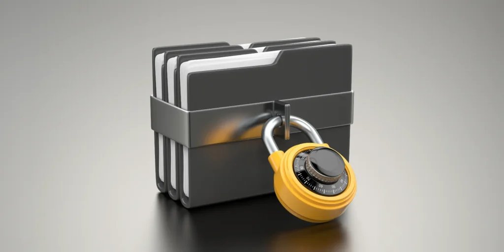 Yellow combination padlock securing a stack of black file folders, signaling locked documents and data protection